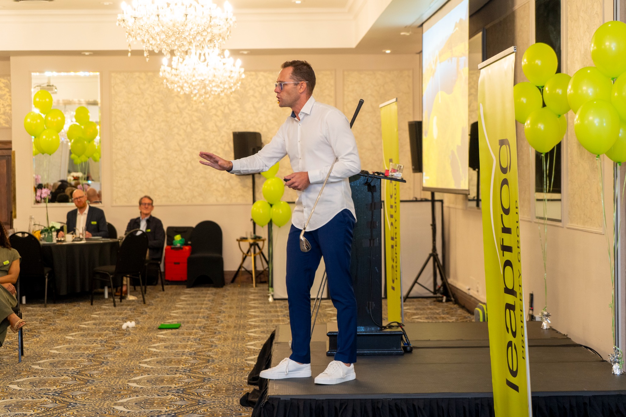 Cameron Venter speaking on stage