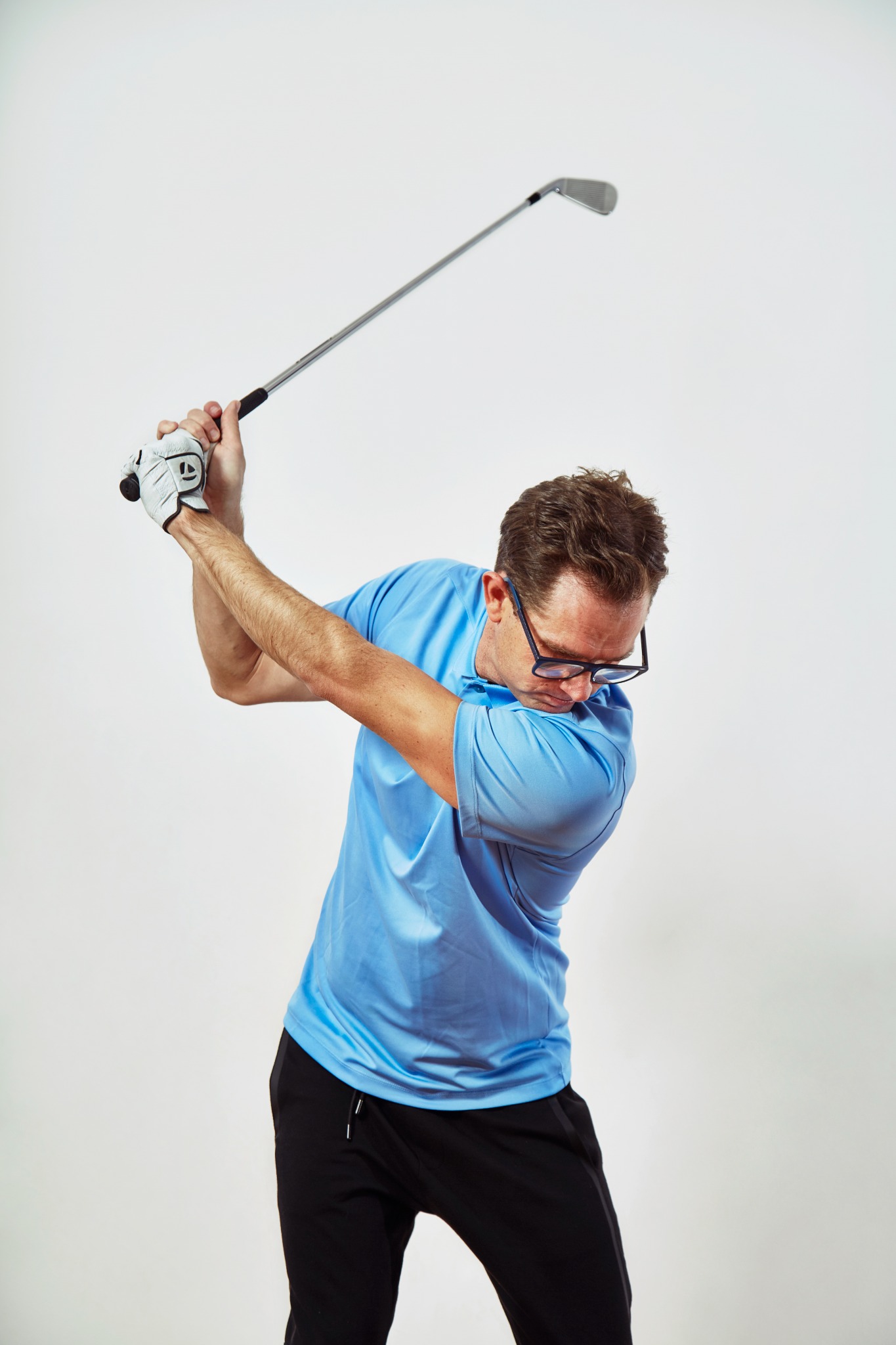Cameron Venter at the top of a golf swing